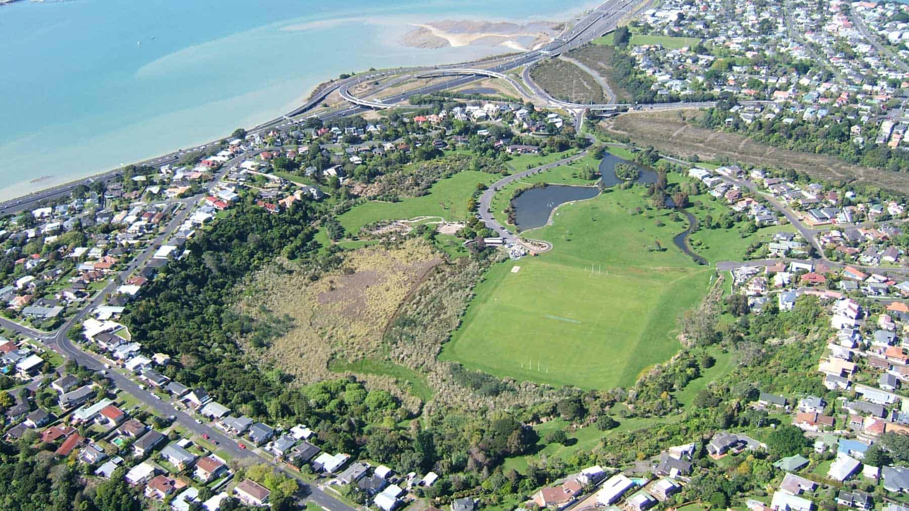 Aerial view of Onepoto crater with playing fields, ponds and the surrounding neighbourhood
