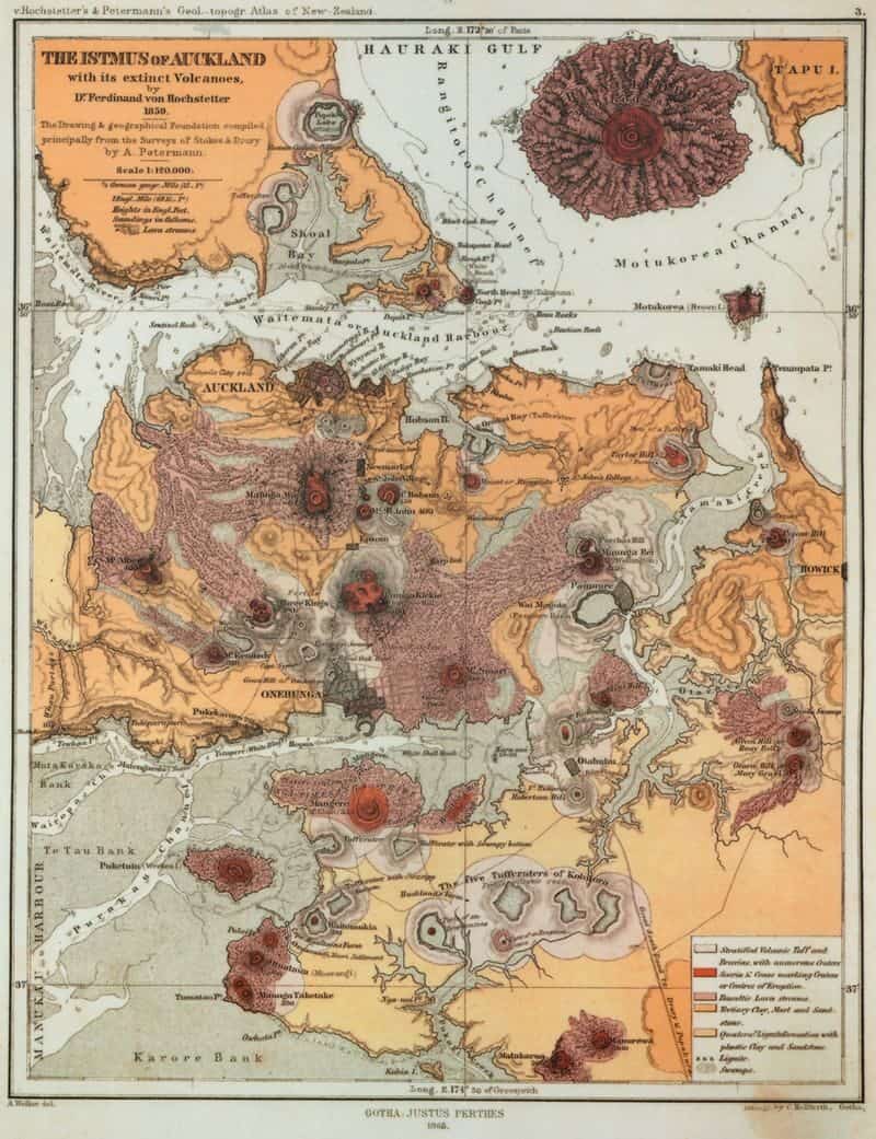 Hand-coloured 1859 map of the Auckland isthmus between the Waitematā and Manukau harbours, the volcanic cones and craters drawn in red and brown, lava flows in orange, and Rangitoto in the top right corner