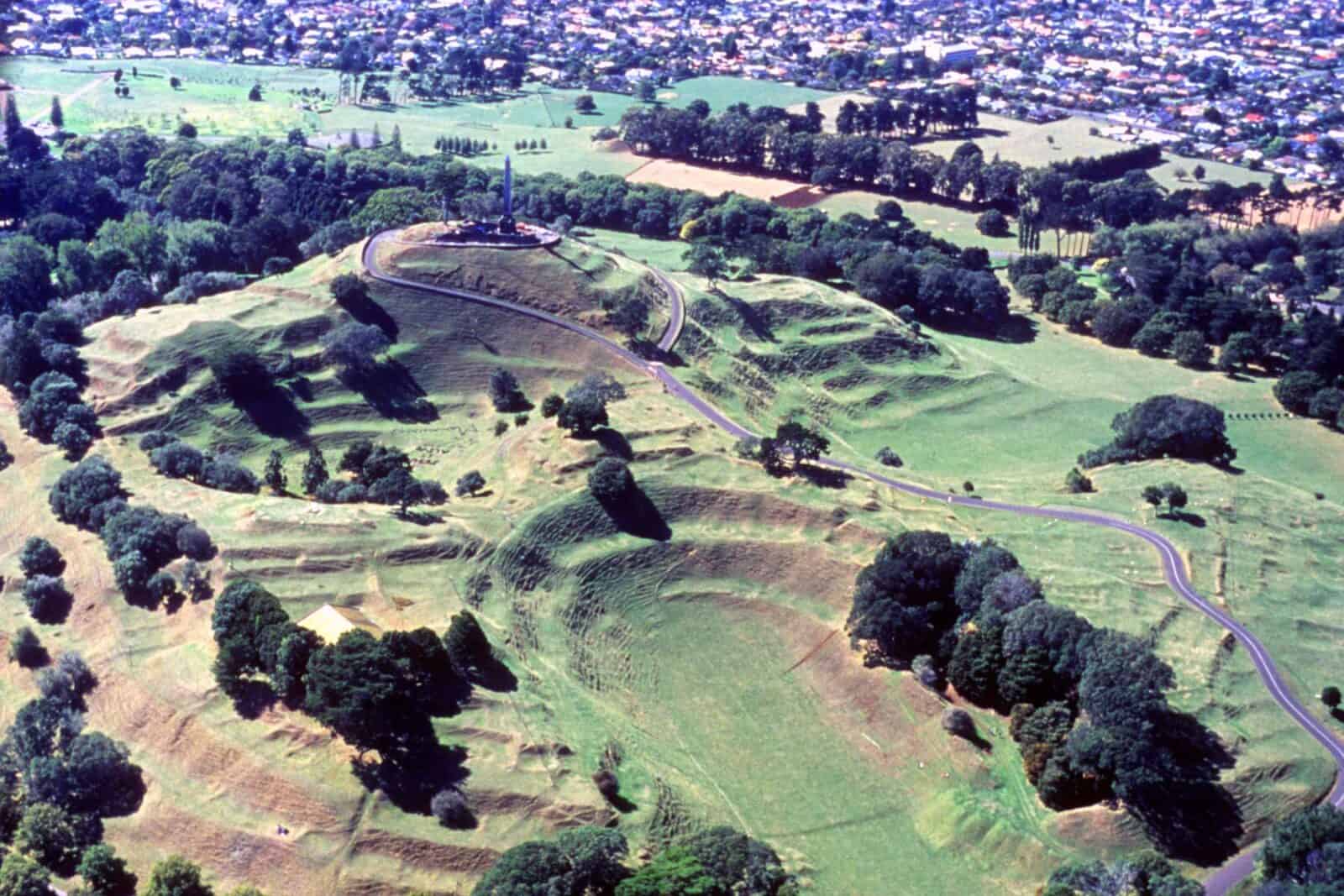 Aerial view of Maungakiekie / One Tree Hill with the terraces and pits of the old pā still marked across its slopes